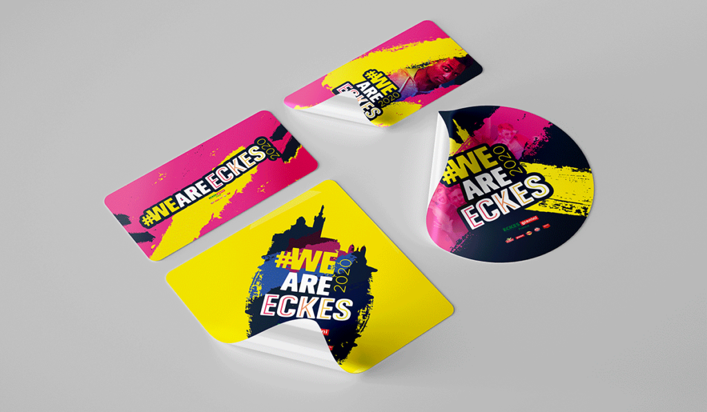 visuel de quatre stickers avec le logo We Are Eckes, réalisés par Laurent Agier, en agence de communication